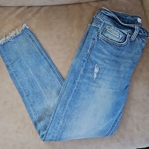 Blue Jeggings with a classic denim appearance and subtle fading